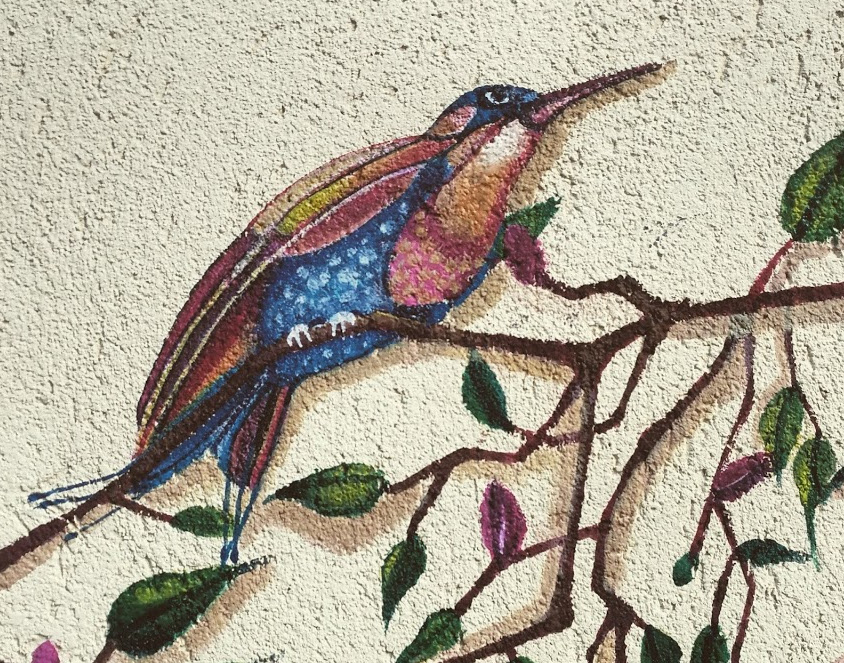 Dipinto su muro uccello